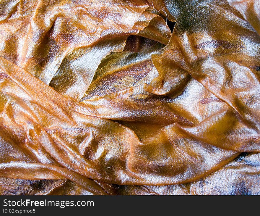 Crumpled surface closeup texture background. Crumpled surface closeup texture background.