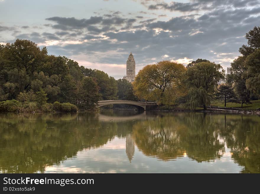 Early autumn in Central Park by the lake. Early autumn in Central Park by the lake