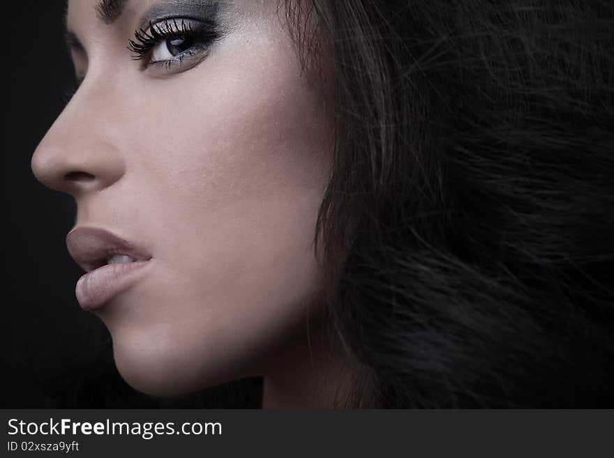 Black hair young woman portrait, studio shot. Black hair young woman portrait, studio shot