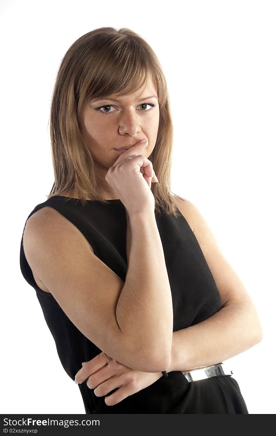 An attractive woman dressed in black on a white background. An attractive woman dressed in black on a white background