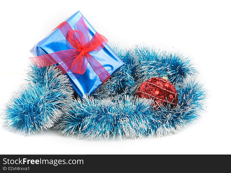 Studio shot of christmas decoration and gift box over white