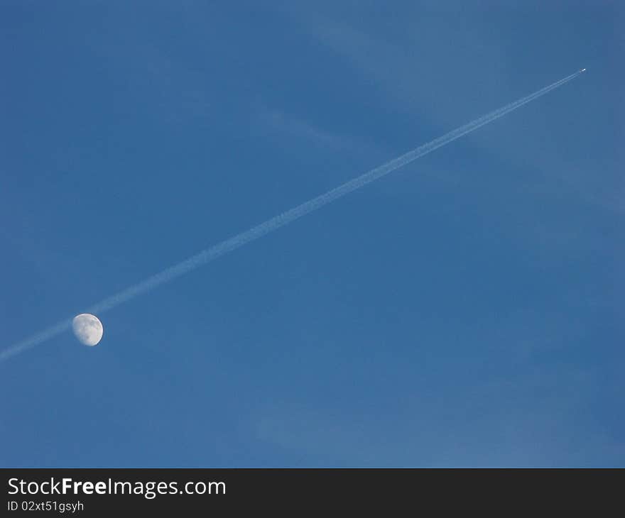 Aircraft and moon on blue sky. Aircraft and moon on blue sky