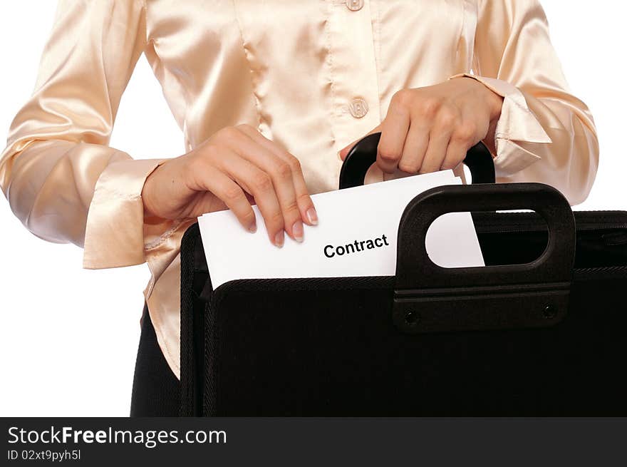 Businesswoman taking out from a suitcase contract for new employees. Businesswoman taking out from a suitcase contract for new employees