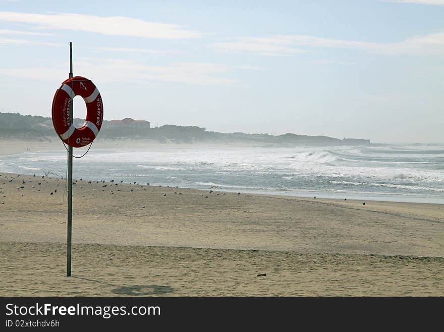 Lifebuoy on beach