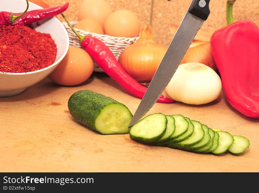 Sectioned cucumbers and raw vegetables