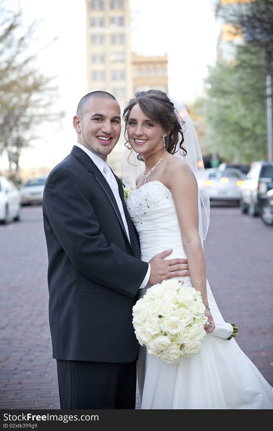 Vertical image of a bride and groom on their wedding day