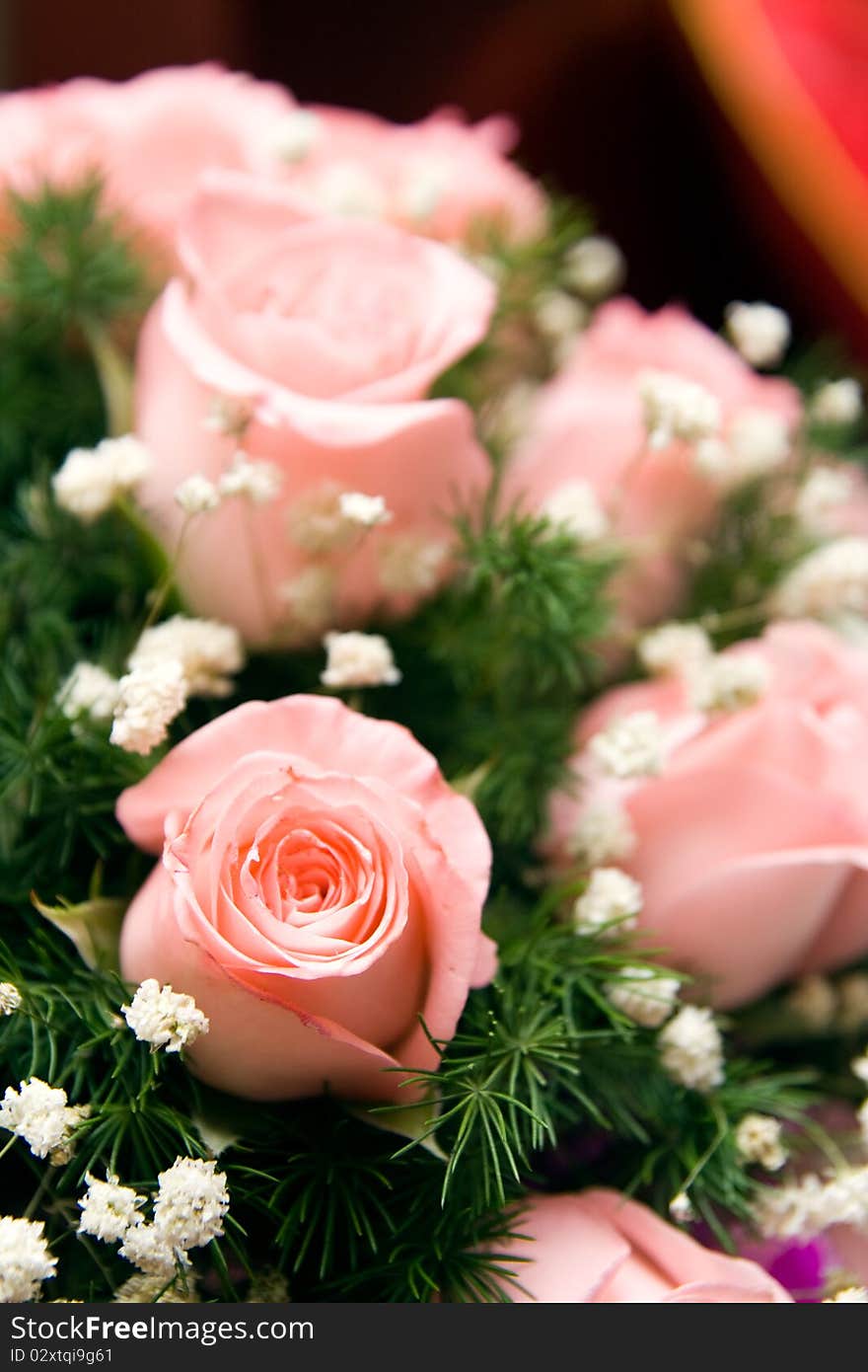 A beautiful bunch of pink roses in wedding. A beautiful bunch of pink roses in wedding