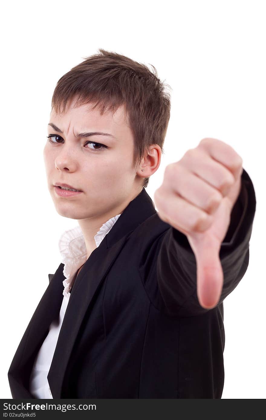 Young business woman gesturing thumbs down over white