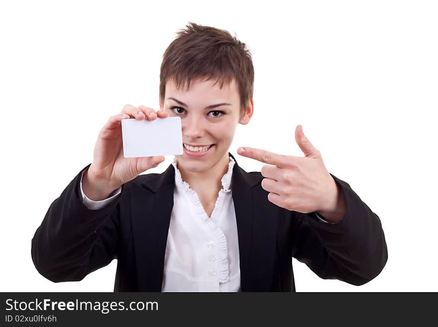 Image of pretty business woman holding a white business card pointing to it. Image of pretty business woman holding a white business card pointing to it