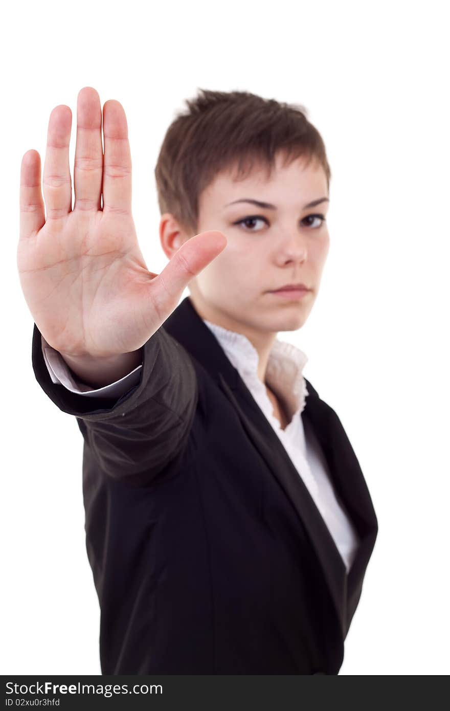 Serious business woman making stop sign over white, focus on hand