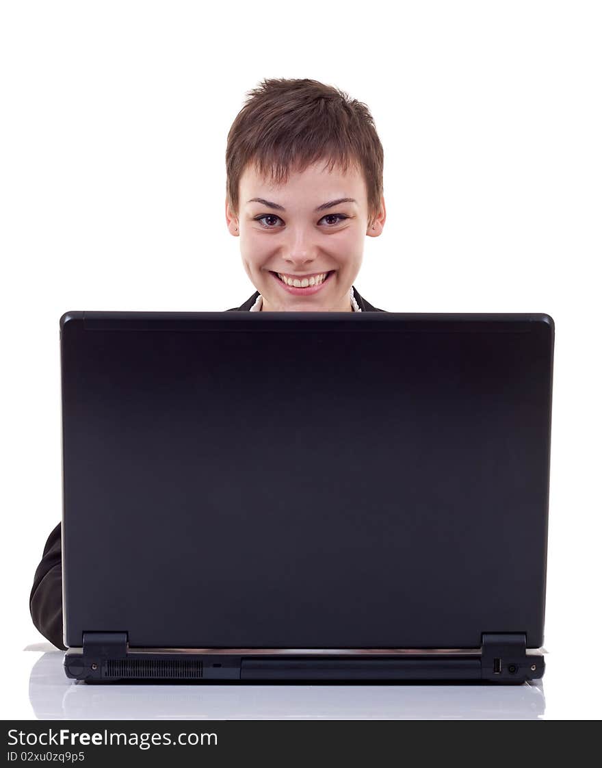 Happy business woman working with laptop at office