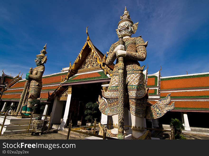 Guardian giant in front of the temple doorway. Guardian giant in front of the temple doorway