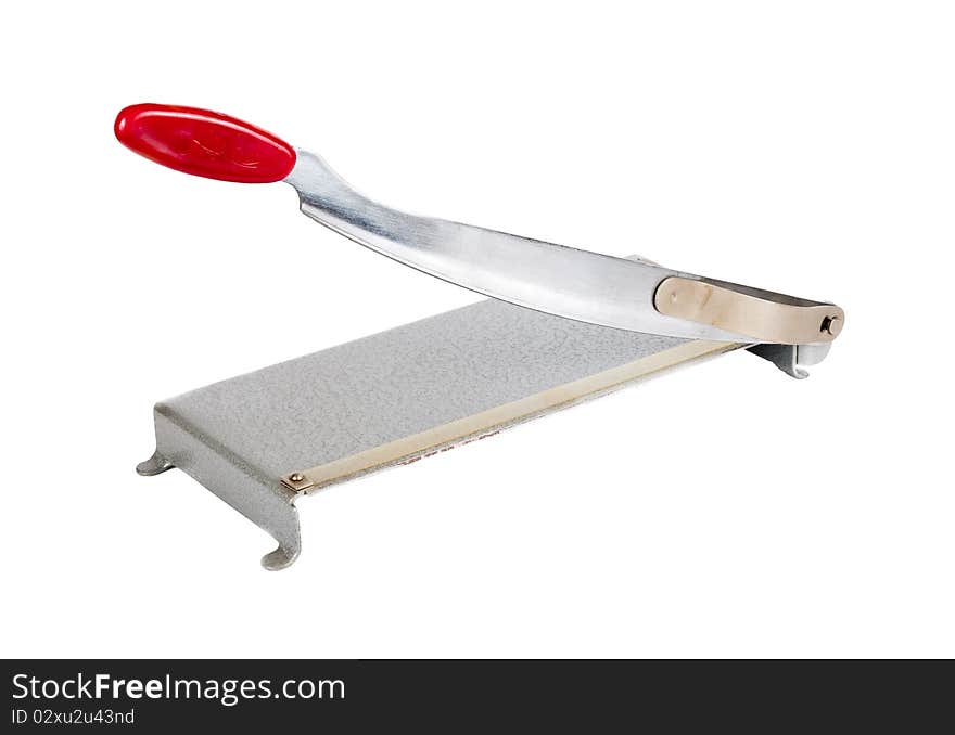 Old photo paper cutter isolated over white background