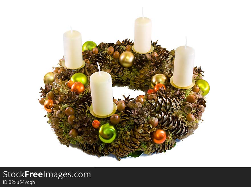 Christmas wreath with four candles isolated on white background