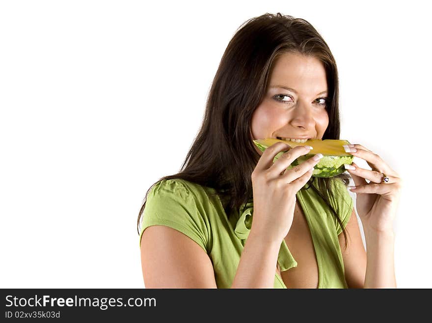 Young girl with citrus fruits on white background