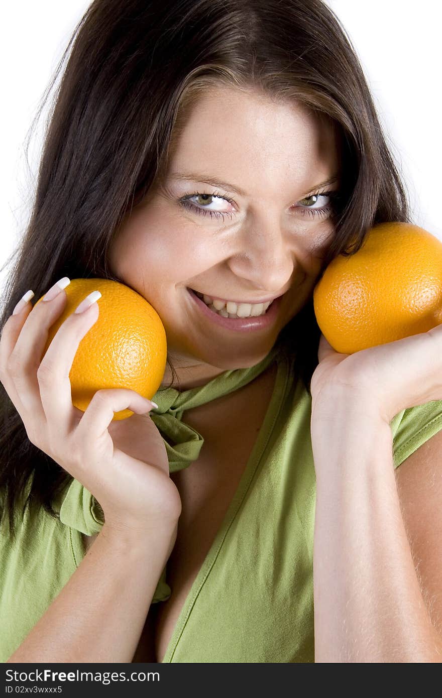 Young girl with citrus fruits on white background