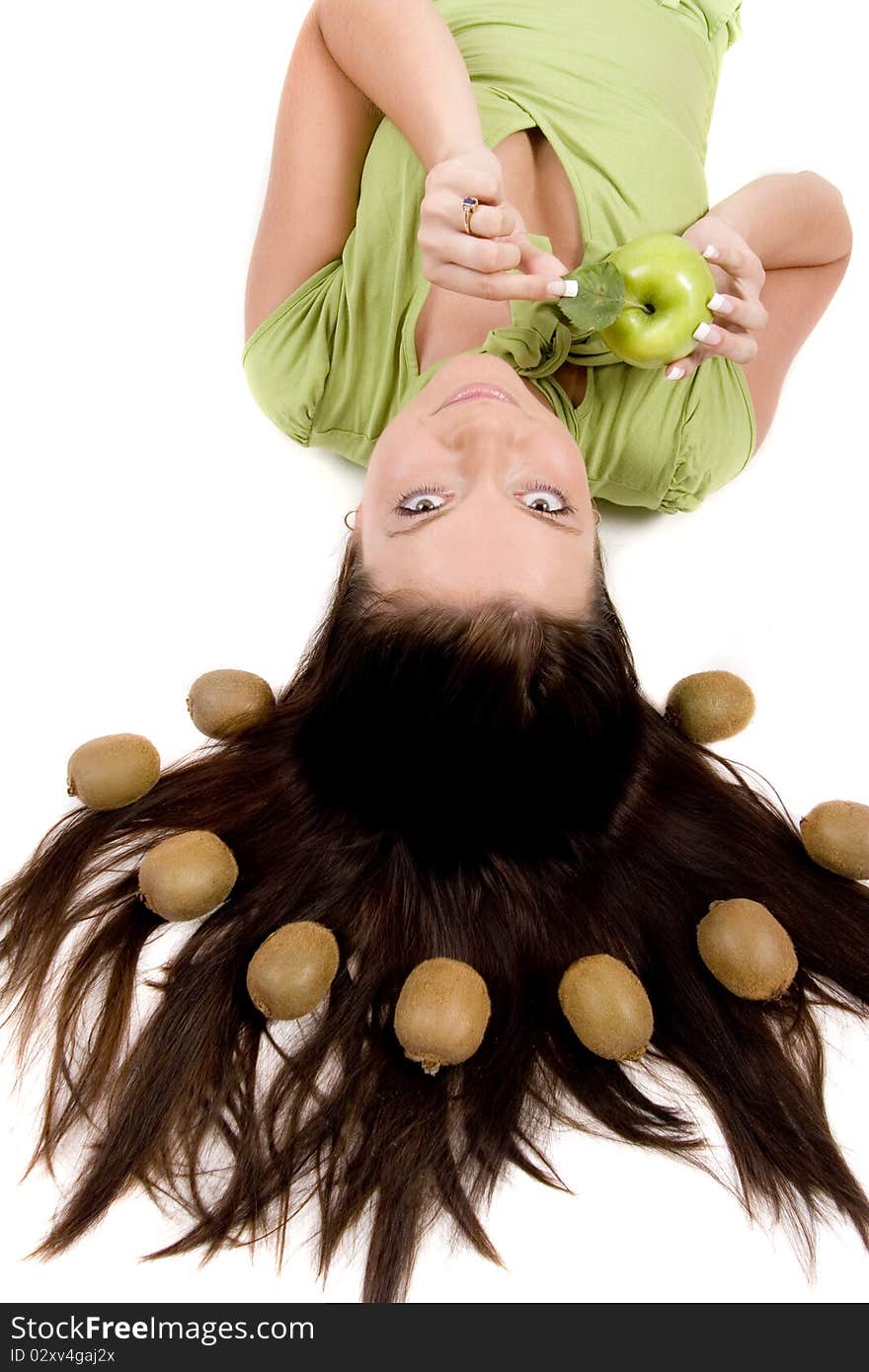 Young girl with citrus fruits on white background. Young girl with citrus fruits on white background