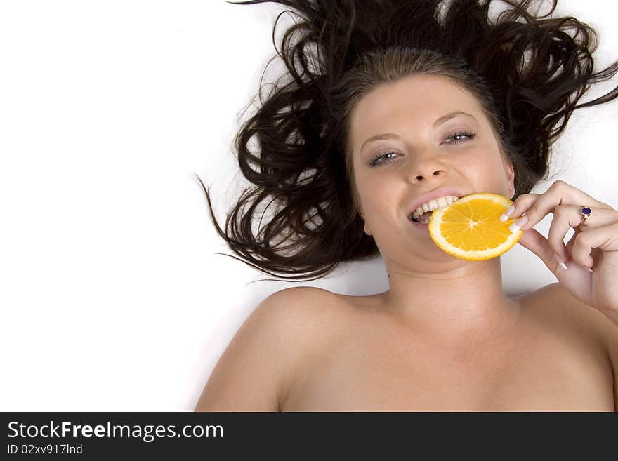 Young girl with citrus fruits on white background. Young girl with citrus fruits on white background