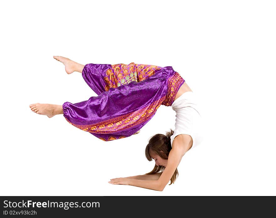 Sportive girl standing on hands