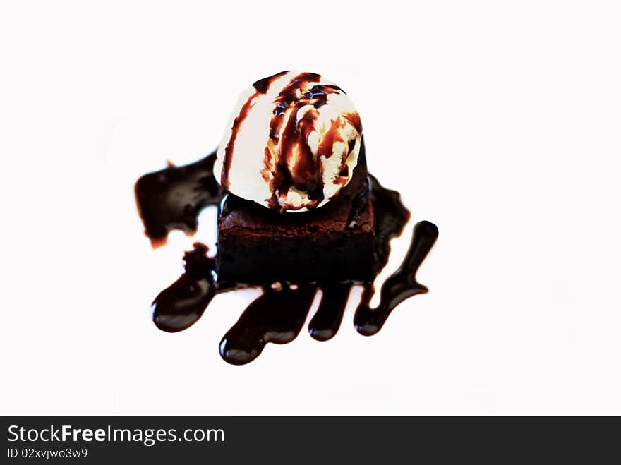 Vanila icecream with chocolate cake isolated