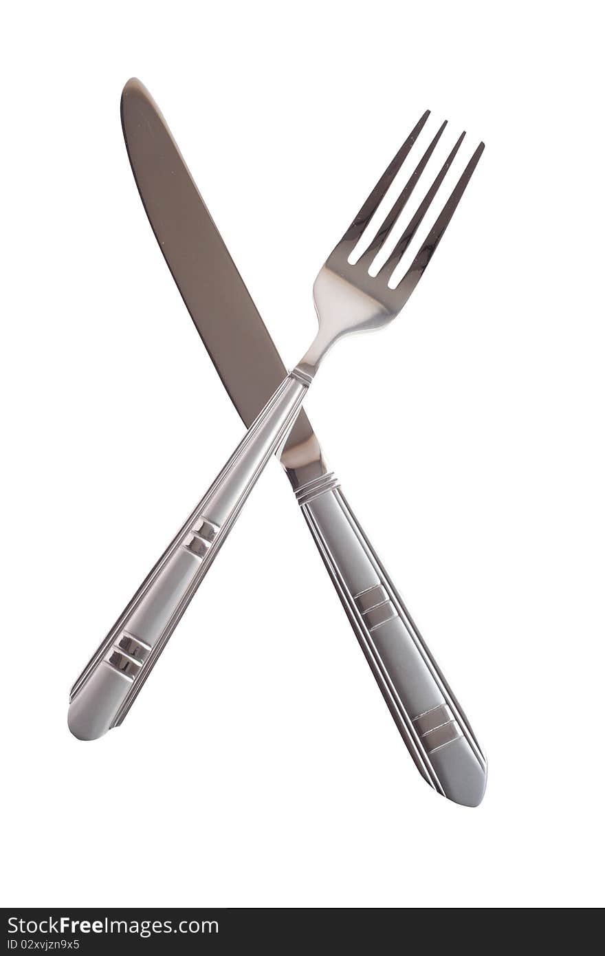 Crossing knife and fork isolated