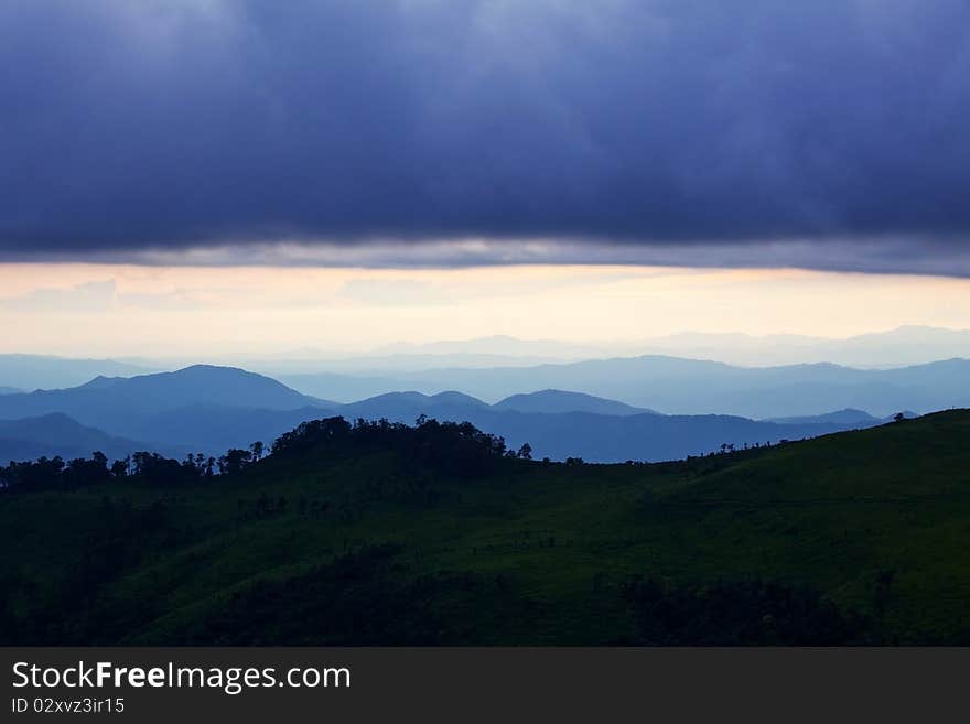 Blue sunset raining in the mountains