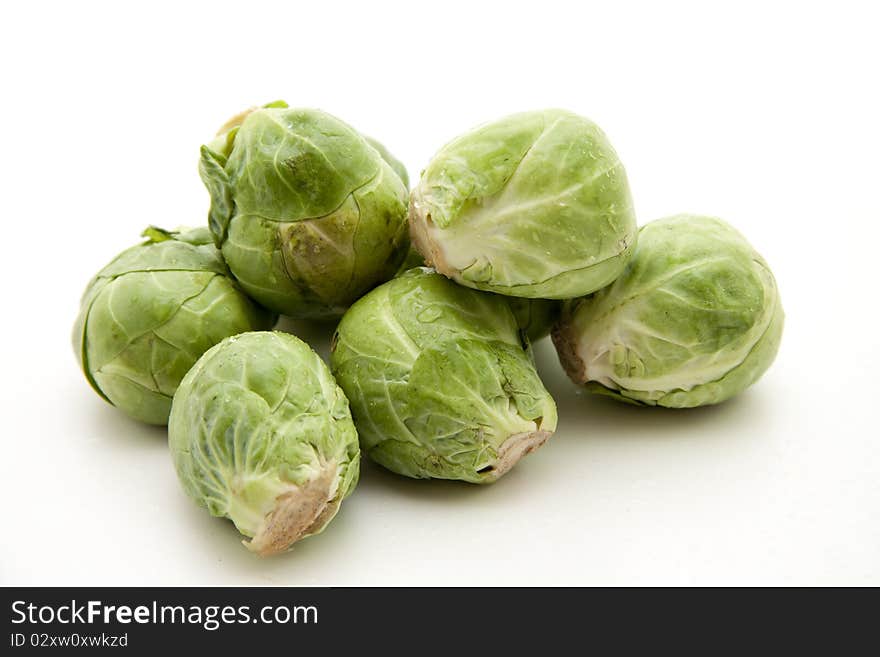 Brussels sprouts onto white background