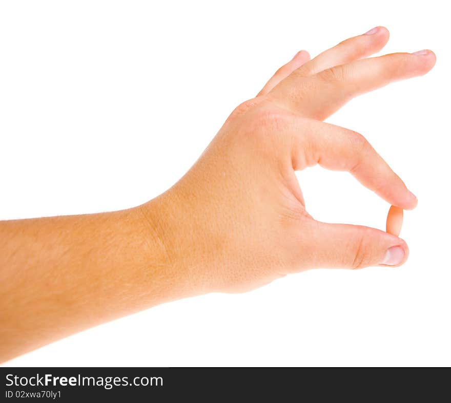 Hand holding pill doctor on a white background. Hand holding pill doctor on a white background