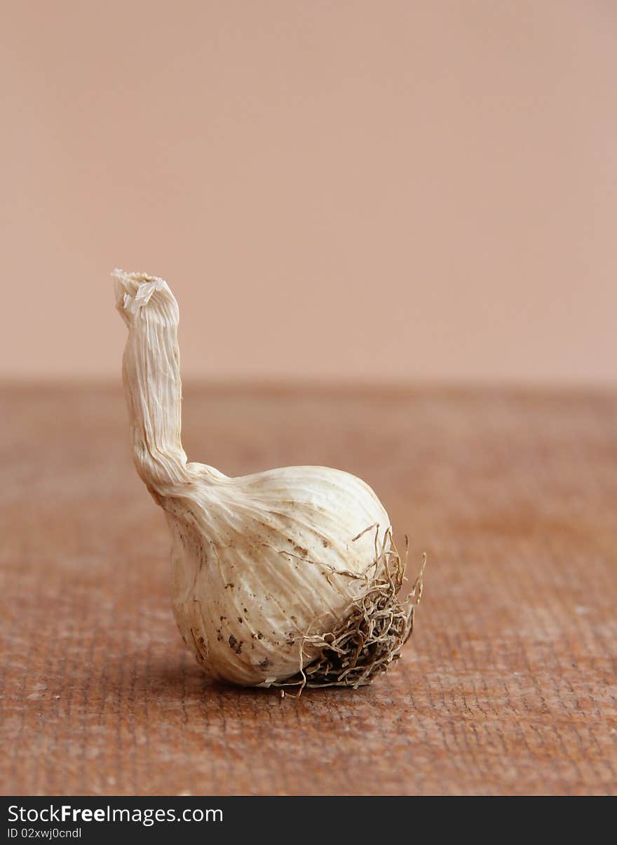 Macro view of garlic on a wooden structure