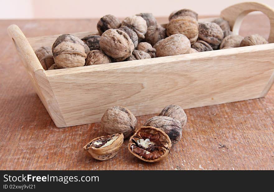 Macro view of walnut on a wooden structure