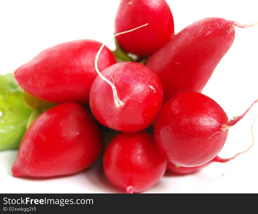 Red radishes isolated on white background