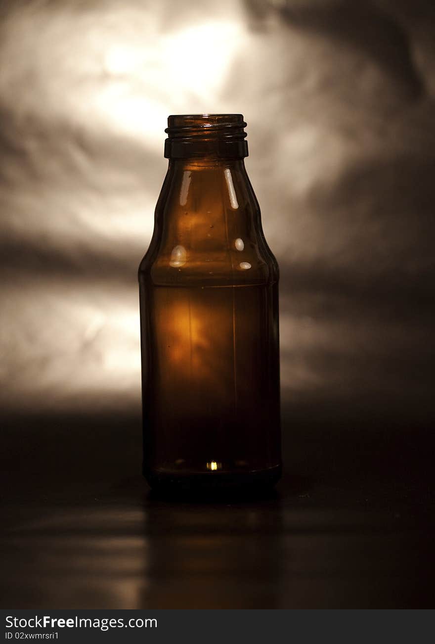 Empty dark glass bottle, mystic bottle, recycling glass. Empty dark glass bottle, mystic bottle, recycling glass.