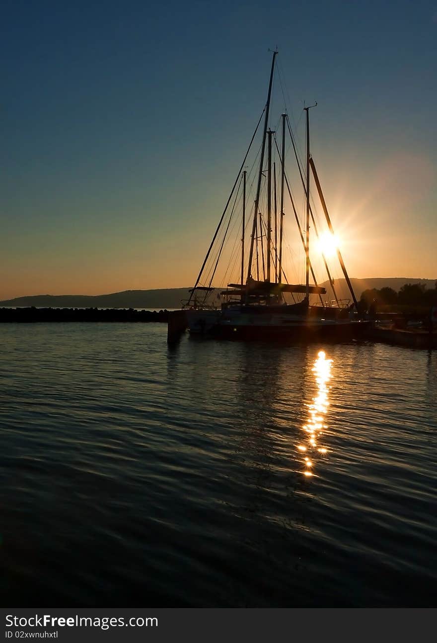 Beautiful sunset in the port of sailing