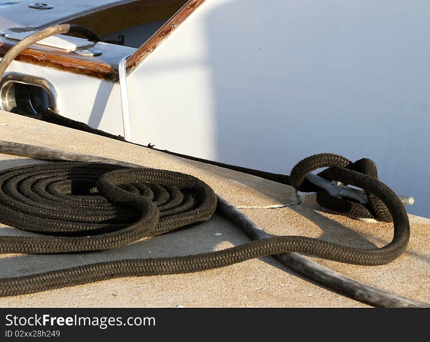 Coiled Mooring Line on the cleat. Coiled Mooring Line on the cleat