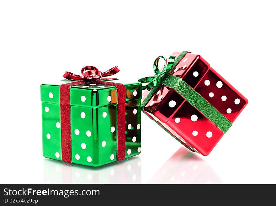 Two glittery square Christmas gift boxes