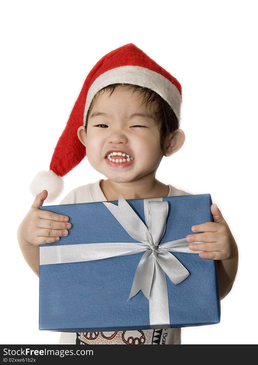 Portrait of a little girl with santa hat and gift. Portrait of a little girl with santa hat and gift