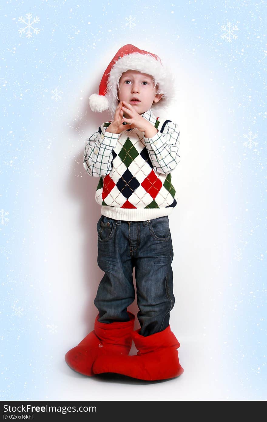 Boy with santa-hat, smiling