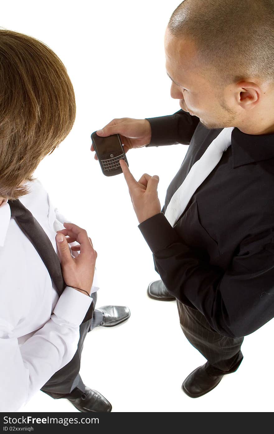 Two young businessman - one asian and one caucasian isolated over white background. Two young businessman - one asian and one caucasian isolated over white background.