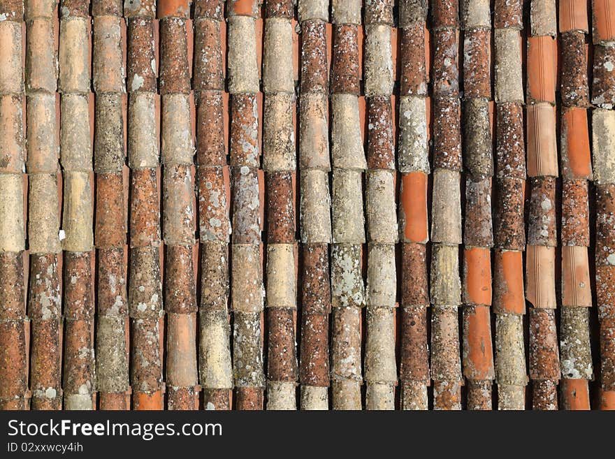 Old obsolete red tile closeup background.