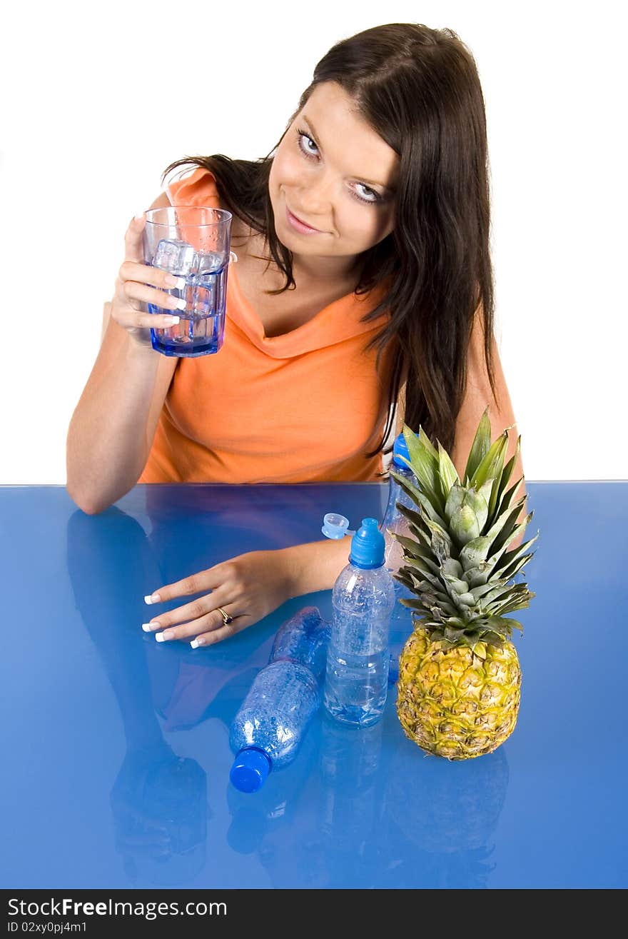 Woman drinking healthy mineral water.Demonstration of healthy nutrition. Woman drinking healthy mineral water.Demonstration of healthy nutrition