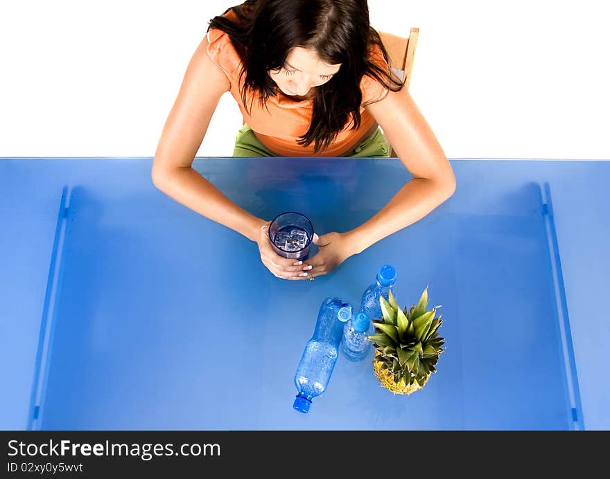 Woman drinking healthy mineral water.Demonstration of healthy nutrition. Woman drinking healthy mineral water.Demonstration of healthy nutrition