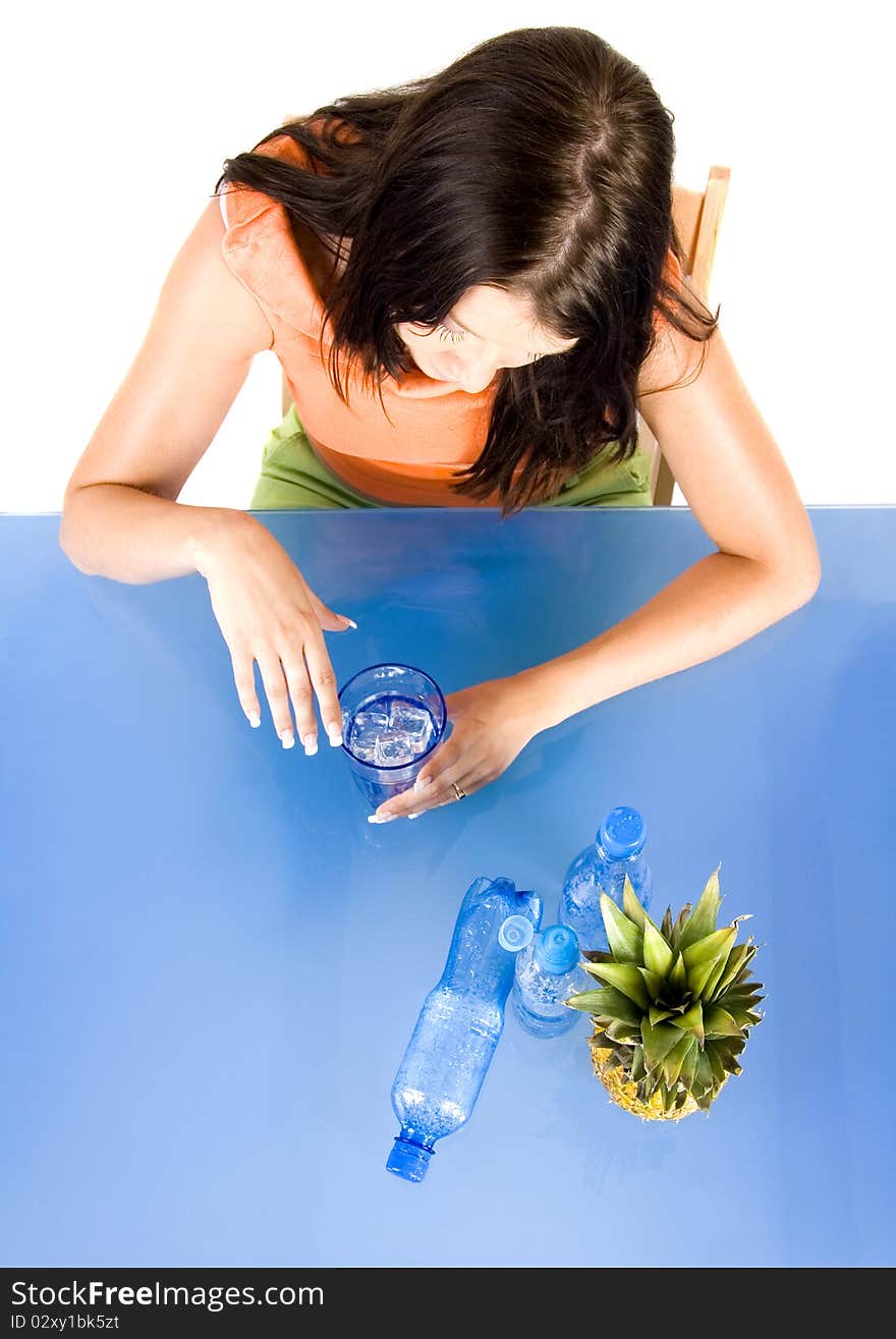 Woman drinking healthy mineral water.Demonstration of healthy nutrition. Woman drinking healthy mineral water.Demonstration of healthy nutrition