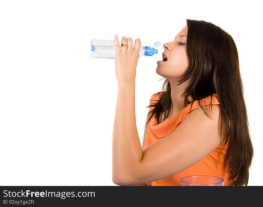 Woman drinking healthy mineral water.Demonstration of healthy nutrition. Woman drinking healthy mineral water.Demonstration of healthy nutrition