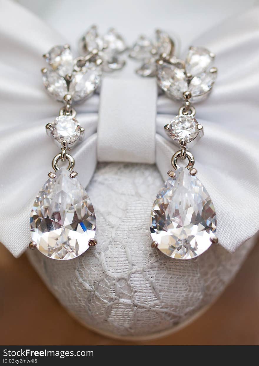 Wedding details. silver ear-rings with large diamonds