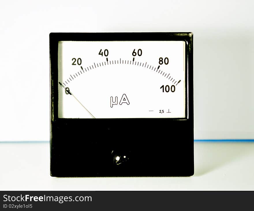 The shoot of measurement device which is necessary for many purposes in techniques, science and education. The amperemeter is on the table. The shoot of measurement device which is necessary for many purposes in techniques, science and education. The amperemeter is on the table