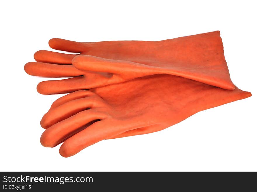 The red rubber gloves on the white surface