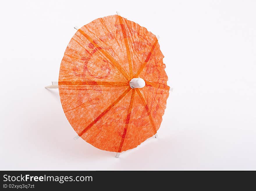 Paper umbrella to decorate the glasses with a cocktail.