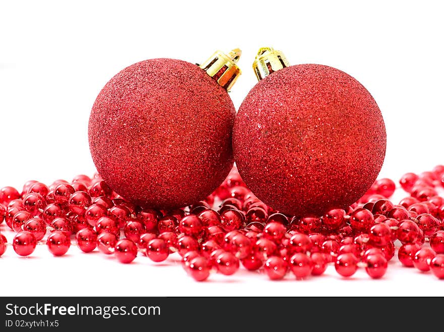 Christmas red balls on the white background