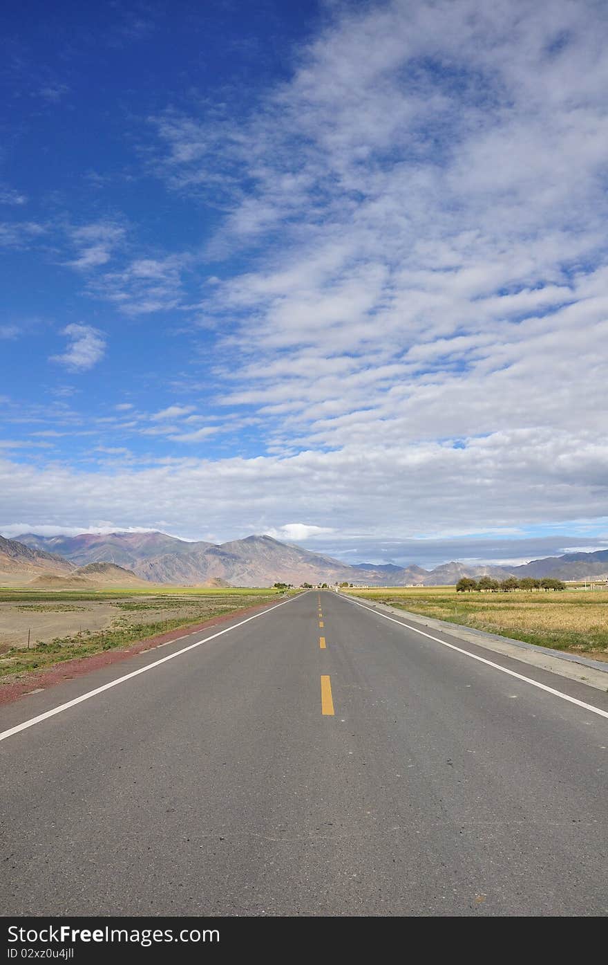 The highway of tibet is wide,open and opaque.What a beautiful landscape. The highway of tibet is wide,open and opaque.What a beautiful landscape.