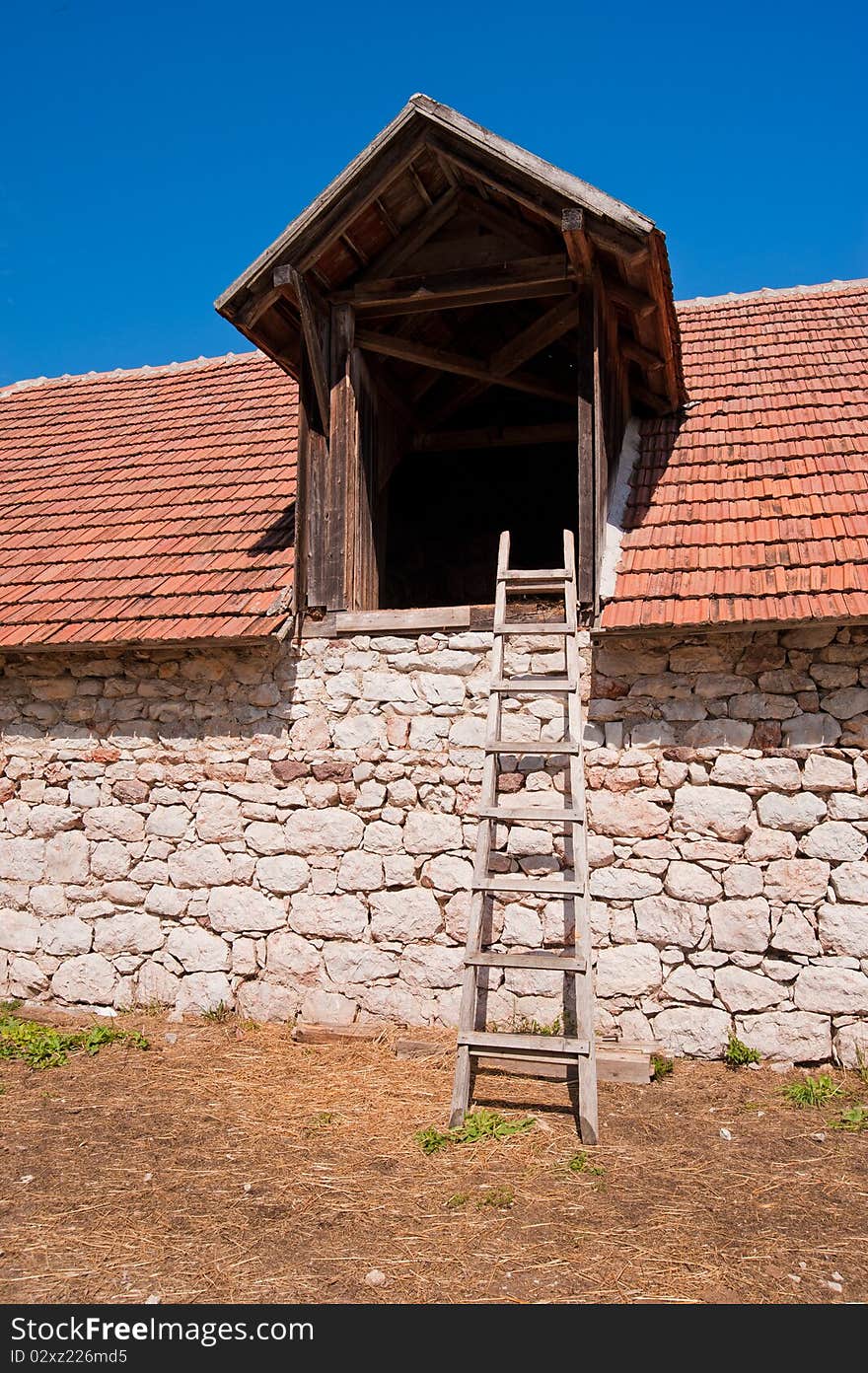 Back of the horse stables with ladder to climb up to the attic. Back of the horse stables with ladder to climb up to the attic